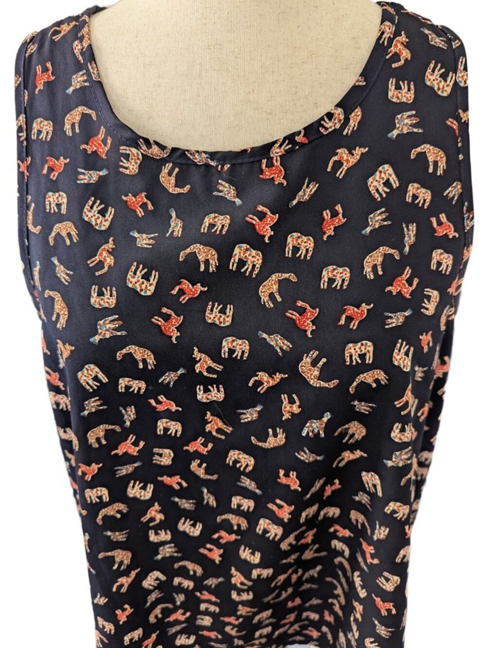 Kaileigh Animal Print Navy Blue Sleeveless Blouse - Picture 2 of 10
